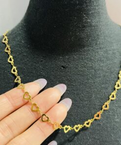 Cadena corazones acero dorado